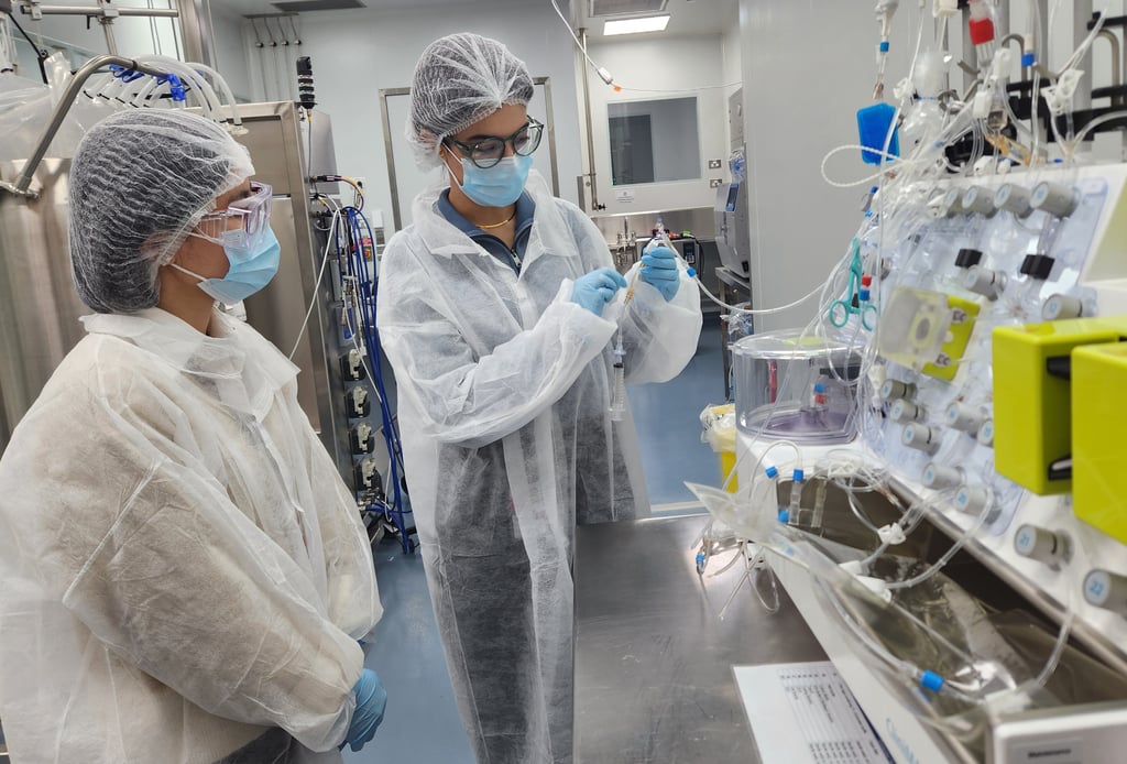 Photo of experts in the Biologics Innovation Facility