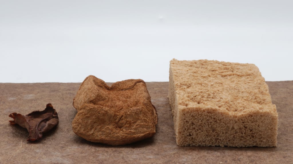 three pieces of cellulose foam material on a brown surface