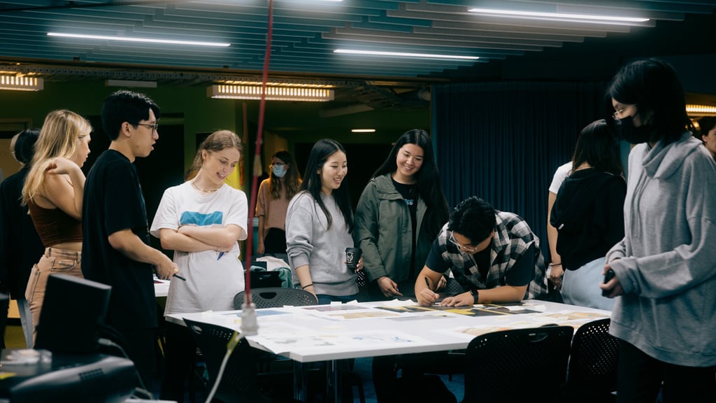 Group of Visual Communication students workshopping ideas