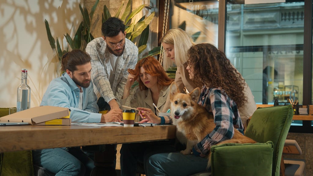 Multiethnic group creative pet dog friendly office coworking diverse team. Picture: Yuliia/ Adobe Stock