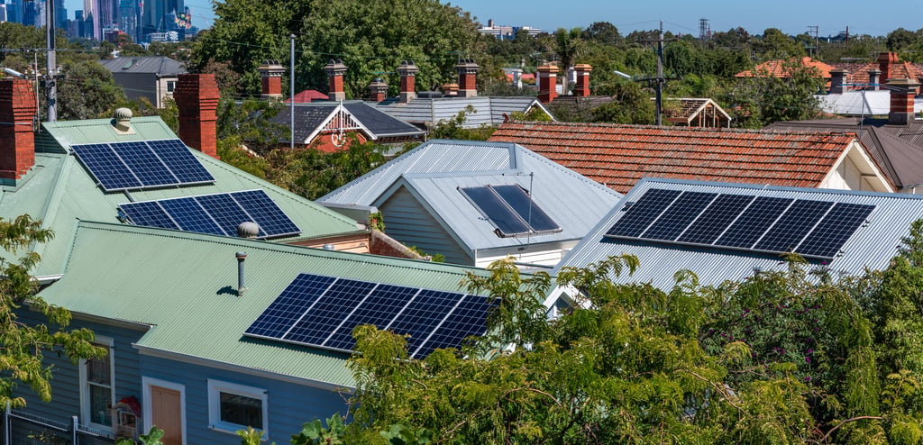Solar panels on suburban house roofs in Australia.