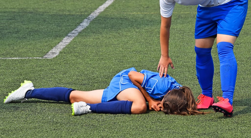injured football player on the ground