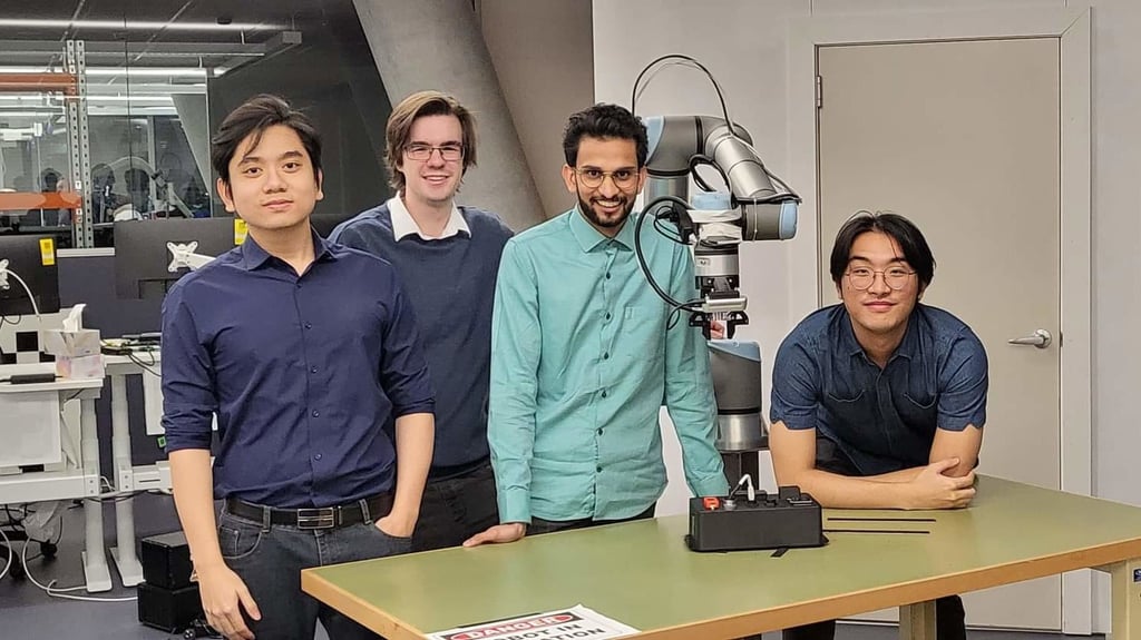 Four University of Technology Sydney students in a lab