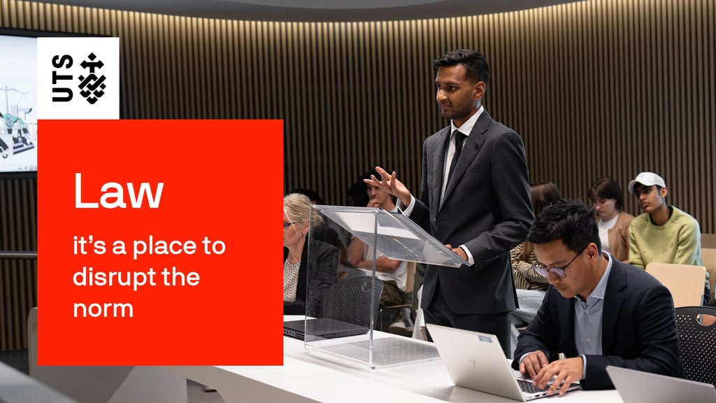 Video thumbnail showing Sai, wearing a suit, presenting in the UTS Faculty of Law Moot Court