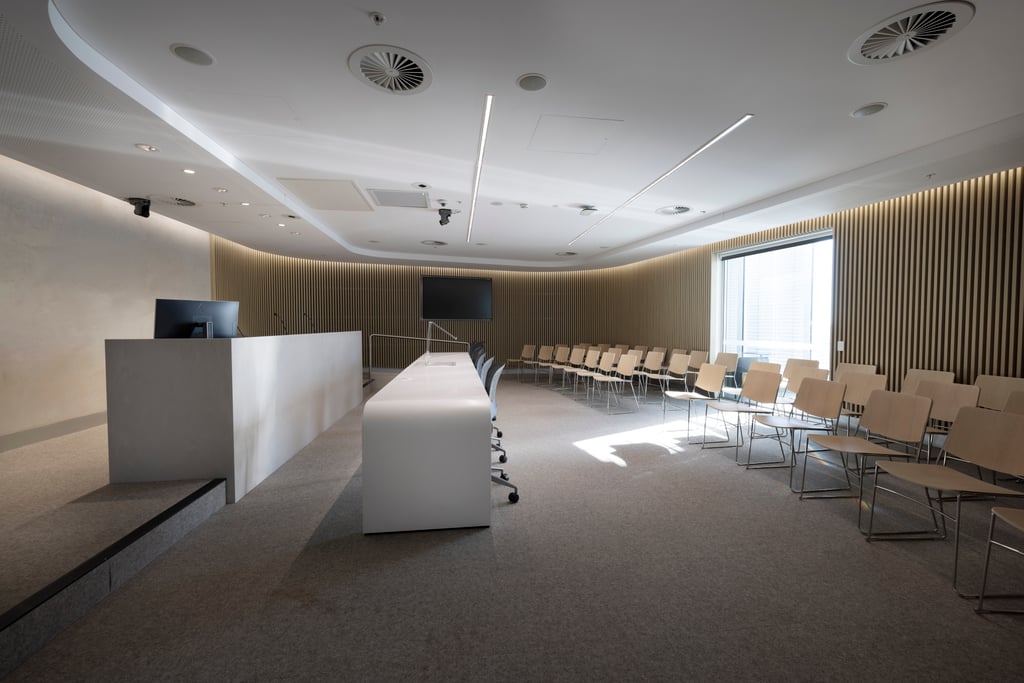 The UTS Moot Court showing the judge's bench, the bar table, a video screen and the public gallery