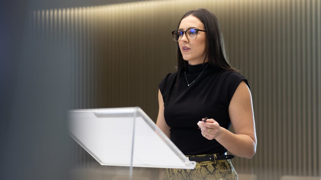 Georgia presents an argument in the UTS Moot Court, where students develop courtroom skills