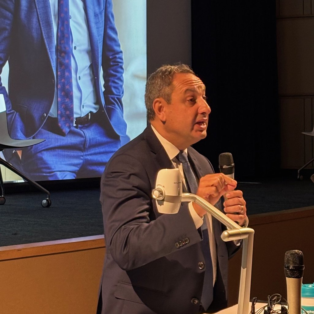 Secretary of the New South Wales Department of Education Murat Dizdar speaks at a conference.