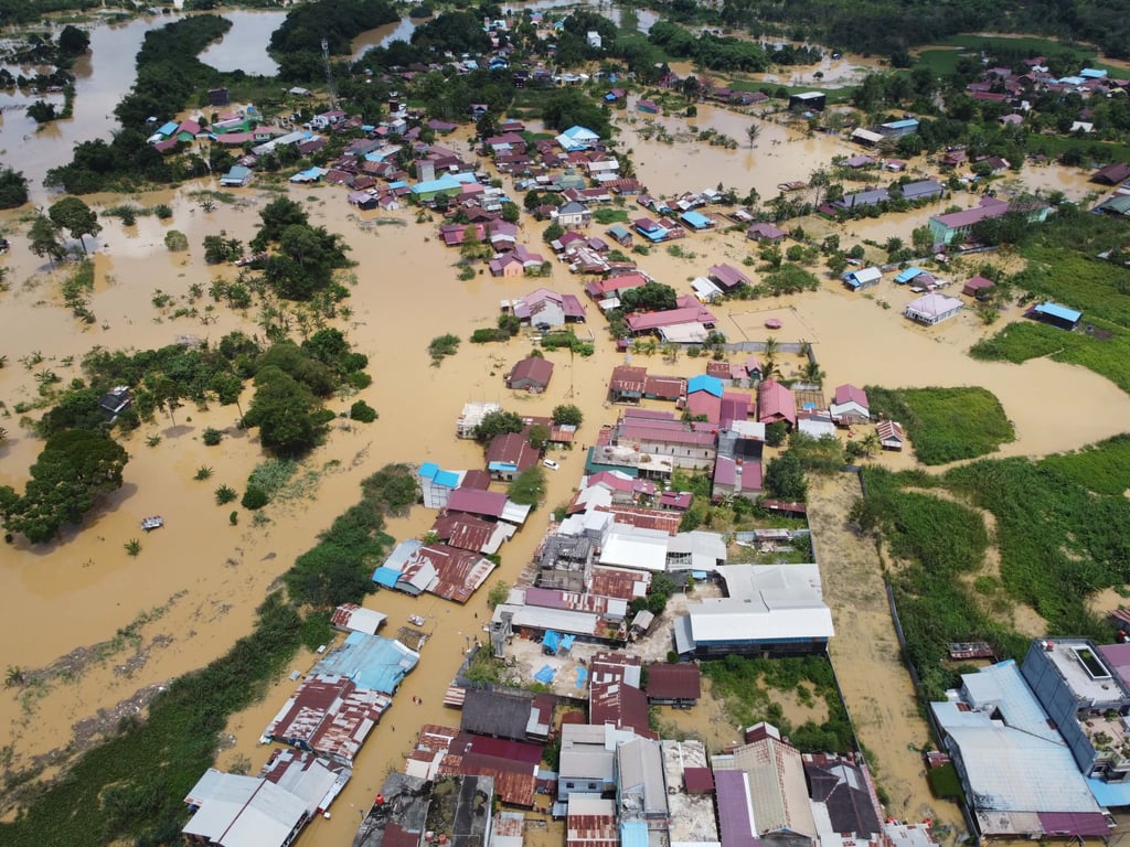 Aerial view of a flooded village in Indonesia.