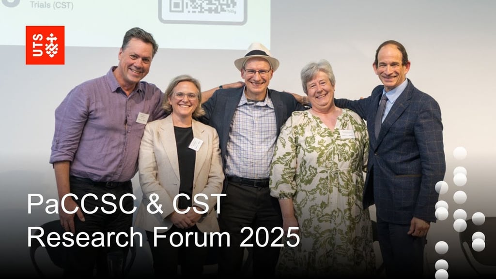 Five people standing together at the PaCCSC & CST Research Forum 2025 event, smiling for a group photo. The event title and UTS branding are overlaid on the image.