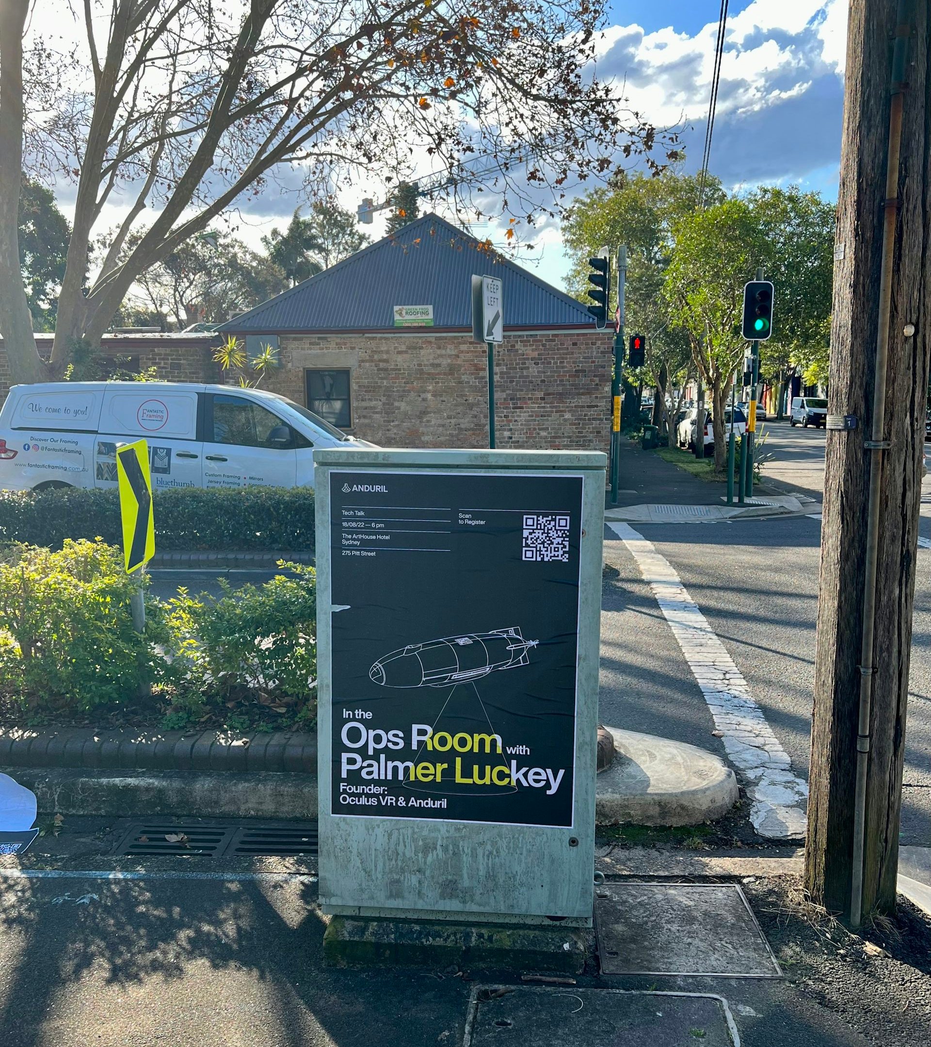 a poster advertising the Luckey talk, pasted to an electricity box on a street in inner Sydney