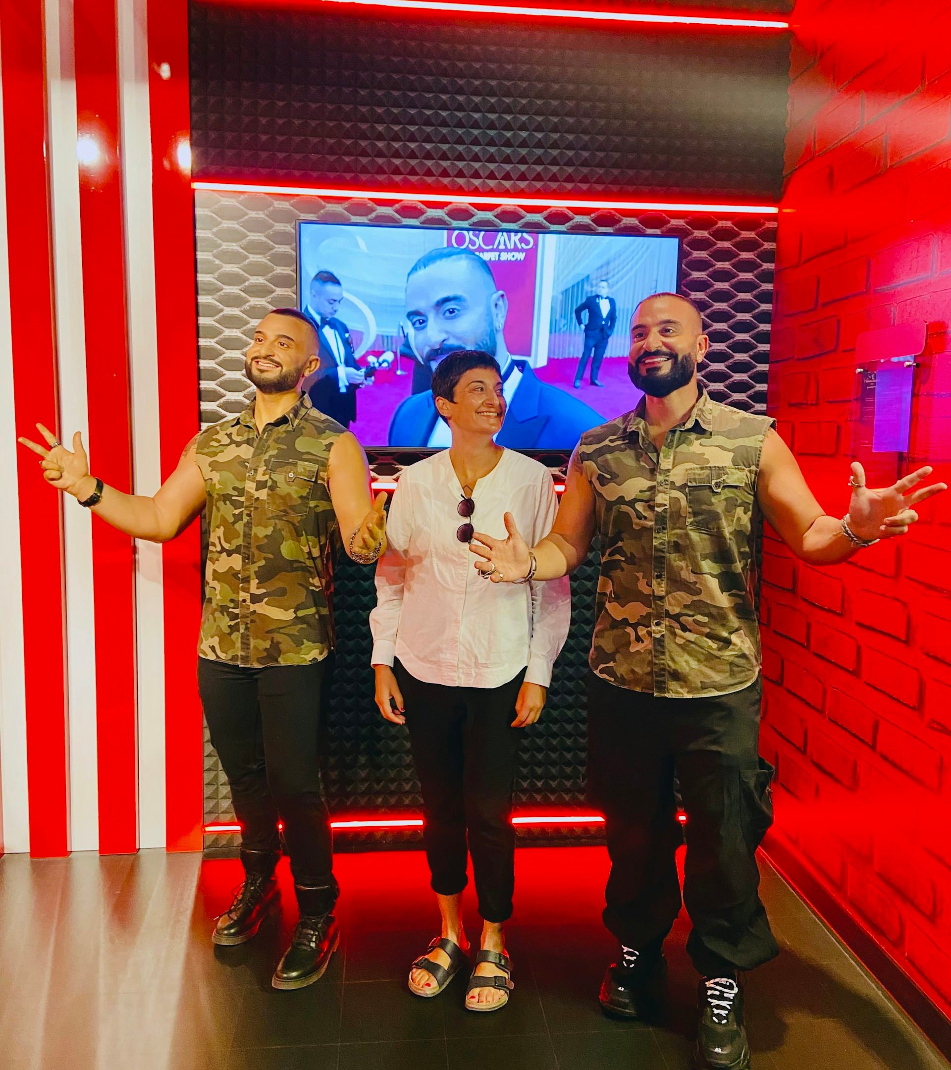 Cherine with her brother and his doppelgänger.