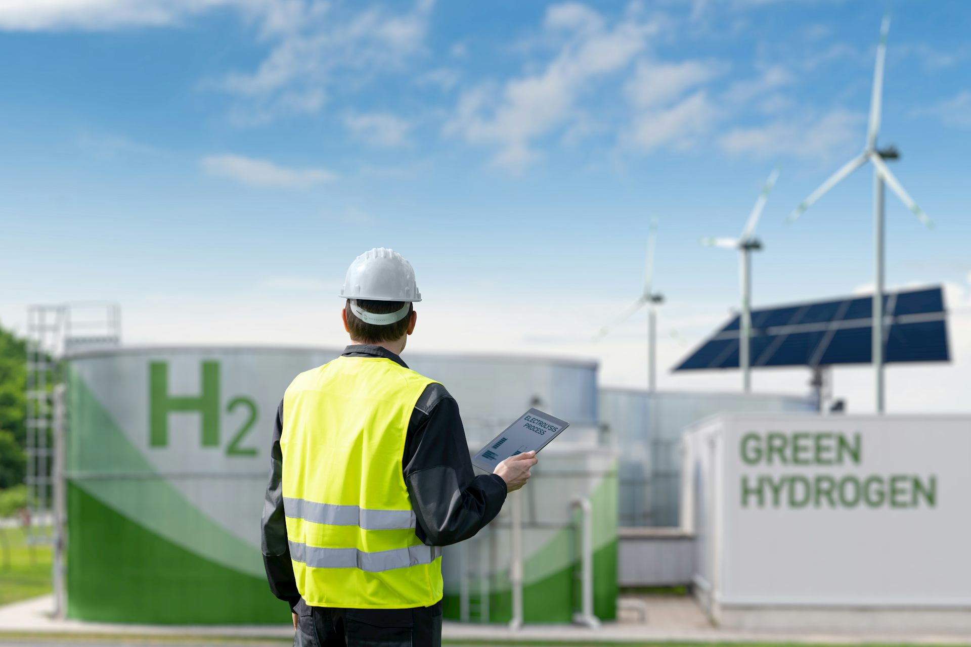 Man standing in front of a renewable energy storage plant