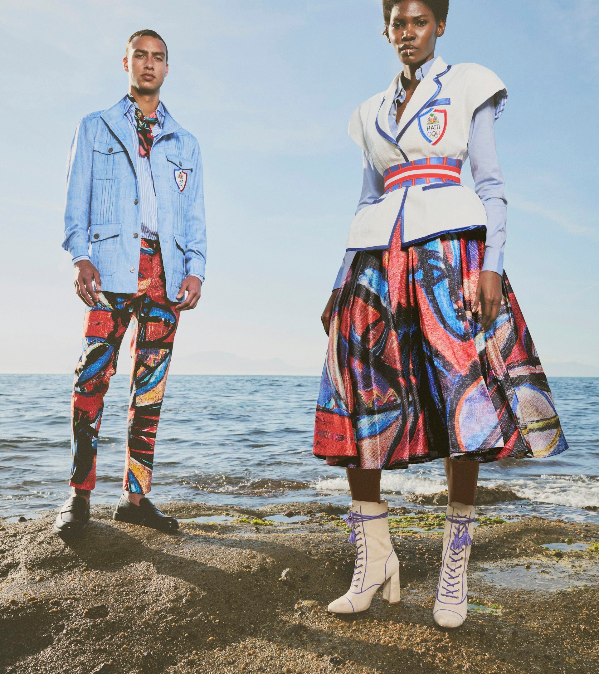 A man and a woman in bright patterns.