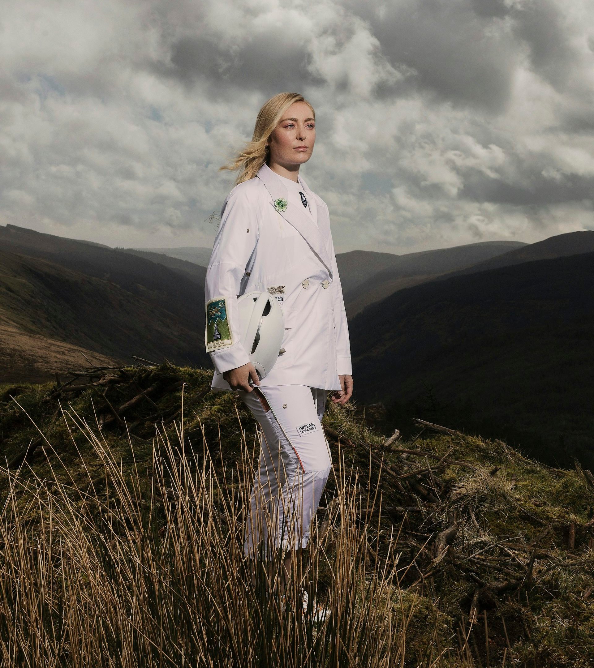 A woman stands in a field