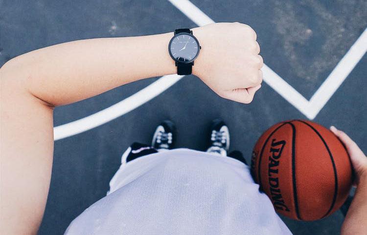 Basketballer looking at watch