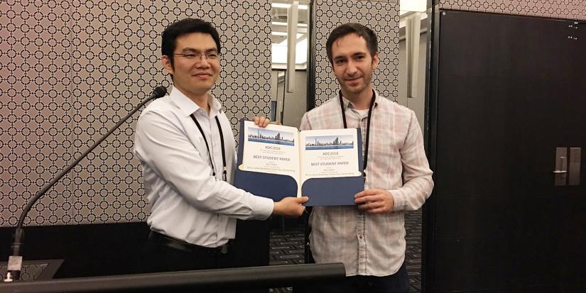 Ben Cuthbert accepting the award for best student paper