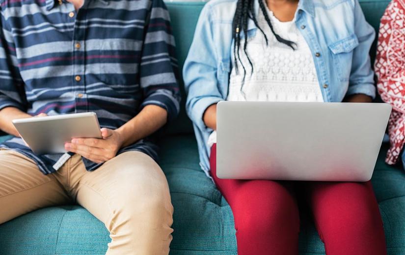 Teenagers with laptop and tablet