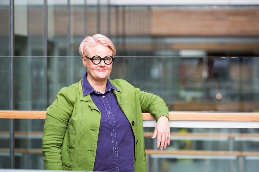 Mary Spongberg standing inside FASS Building
