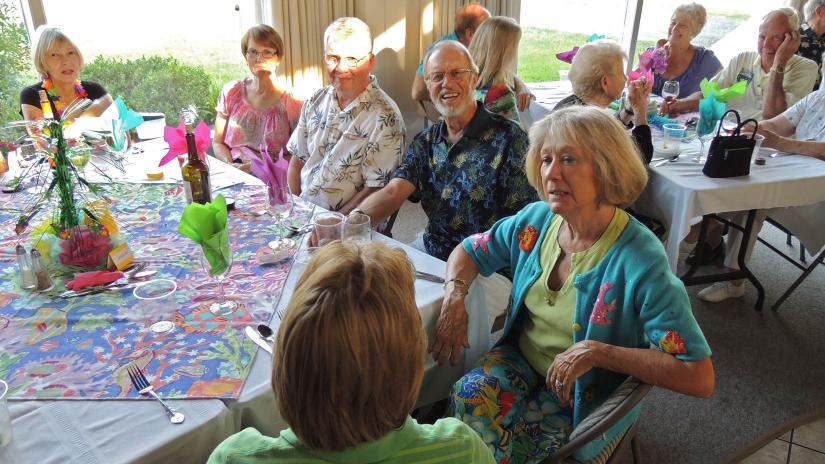 Elderly people at dinner. Photo by poaphotos on Flickr.