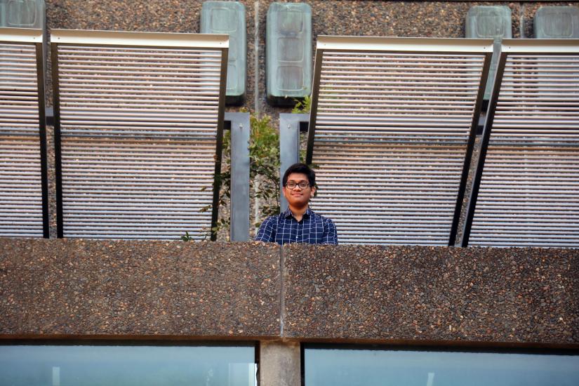 Image of Mujibur Rahman taken from below as he stands on a higher level of the Tower.