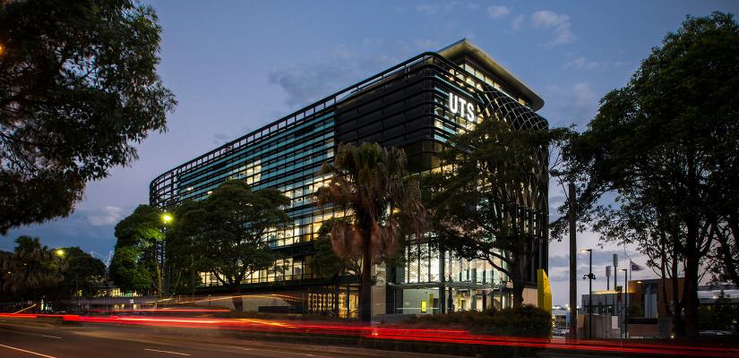 UTS Rugby Australia Building illuminated at night