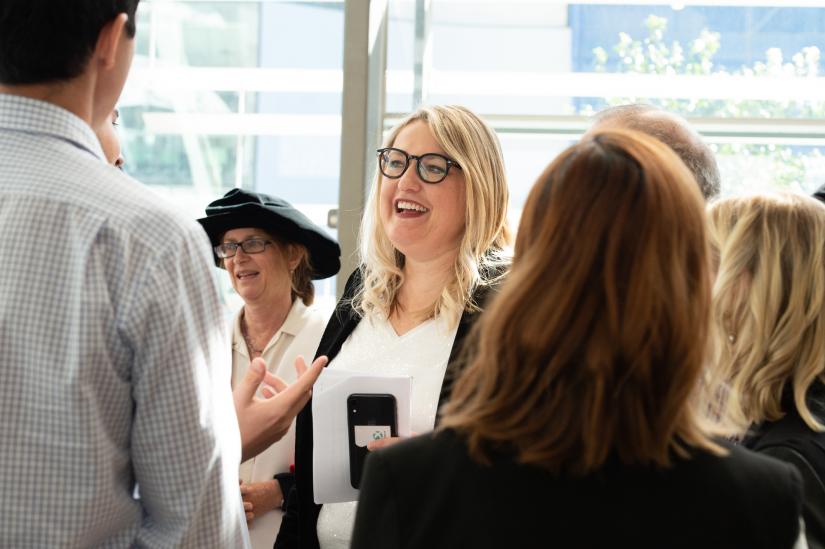 UTS Built Environment alumna Louise Vlatko mingling with attendees of the graduation ceremony