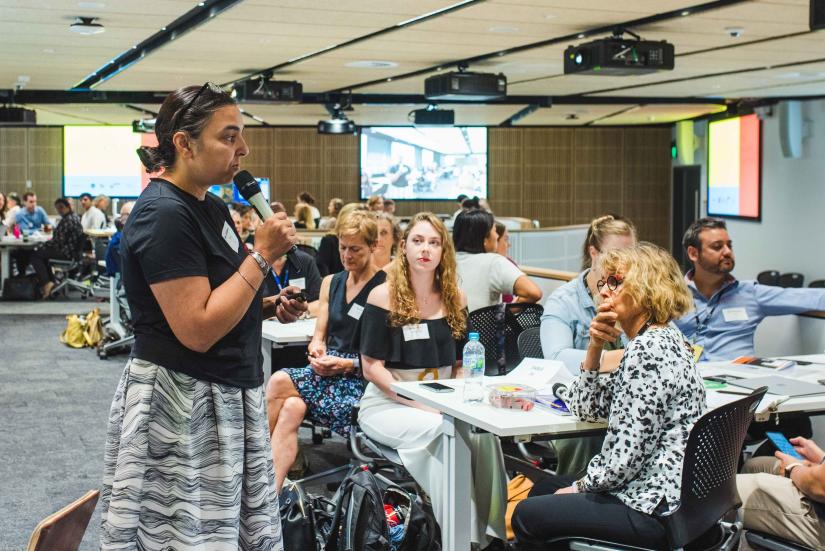 Mitra Gusheh presents at the event