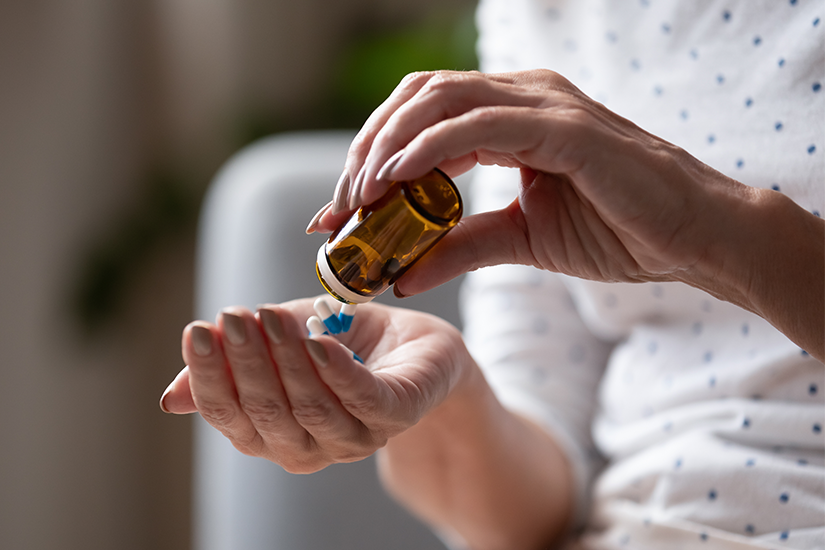Woman taking medication