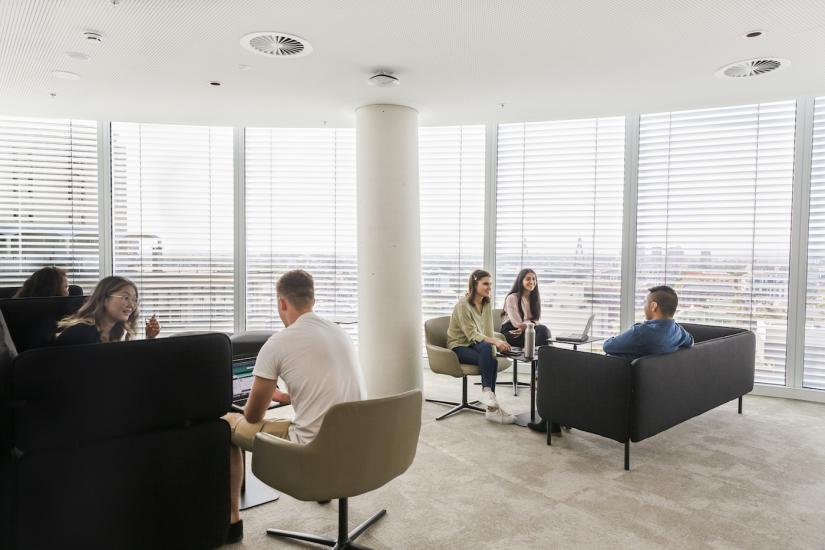 A group of students having a group meeting