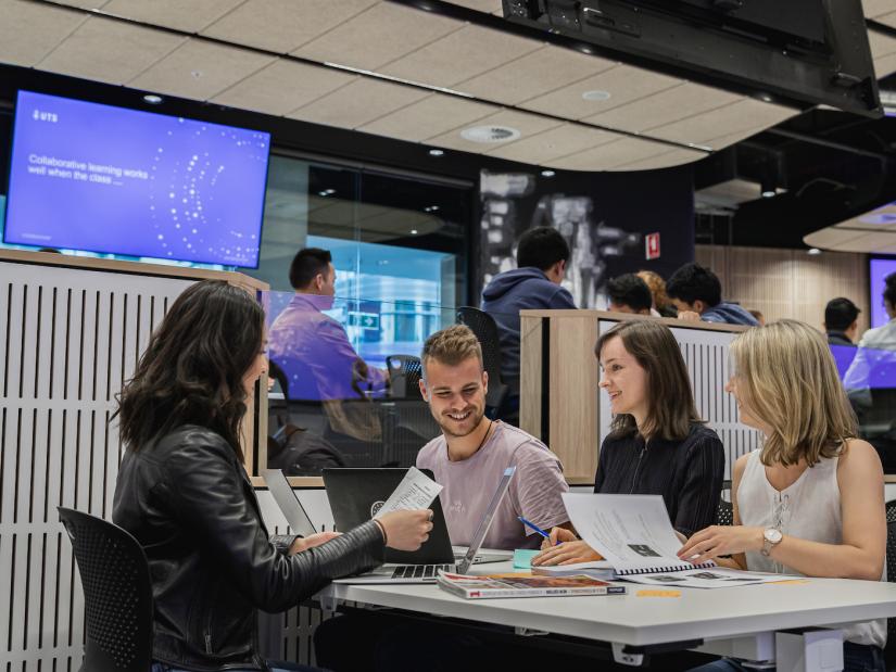 A group of students having a group meeting