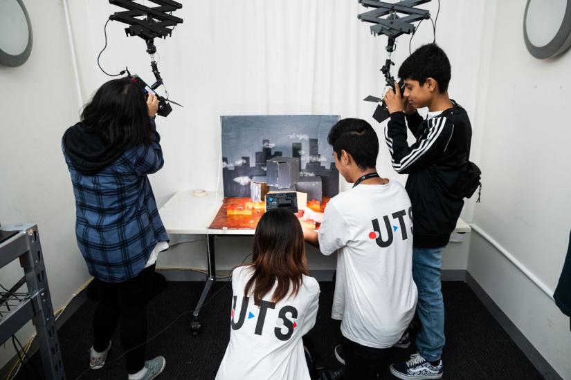 A group of students working together on a stop motion film