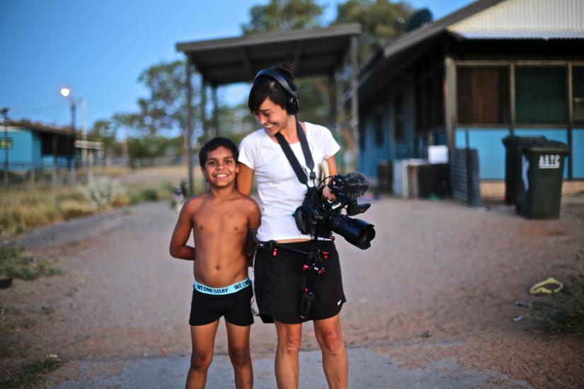 Dujuan Hoosan and Maya Newell standing on a street