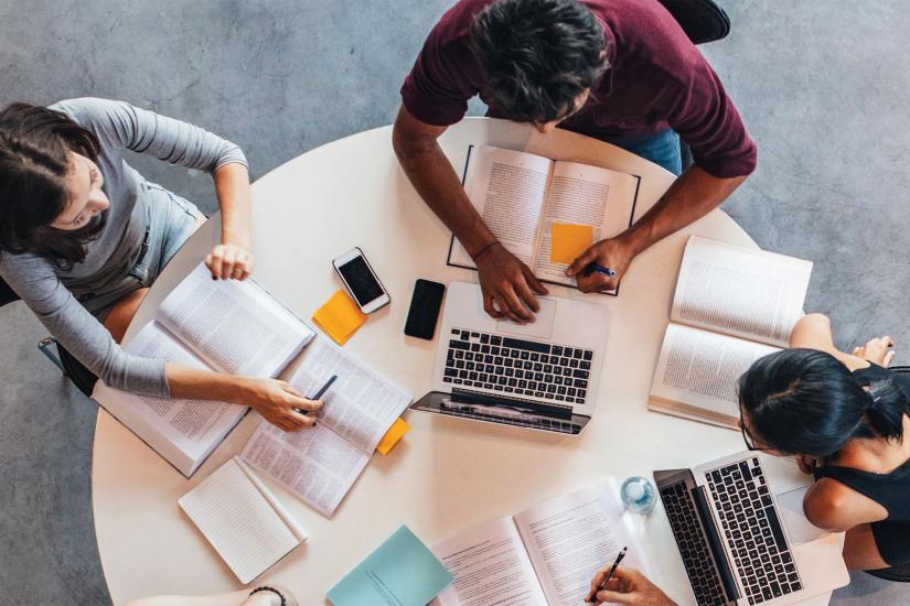 Overhead shot of a group of students around a table