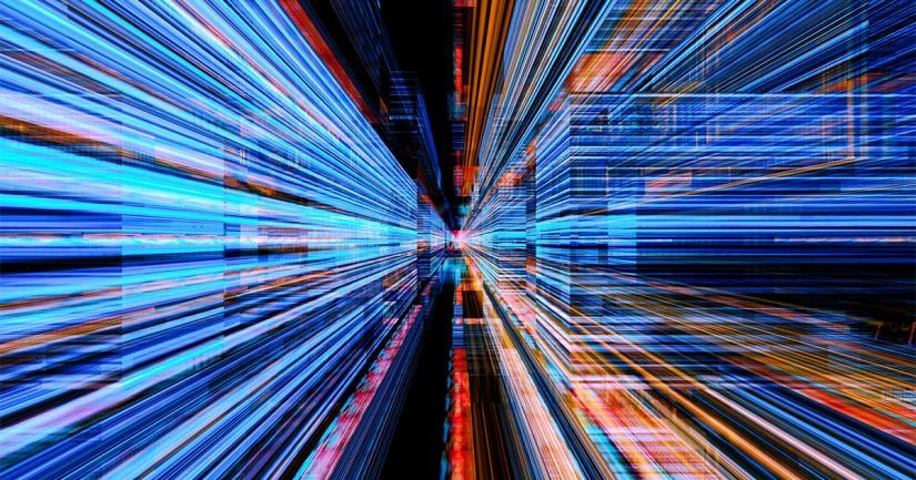 blue, orange and red abstract lights streaming out from a single point