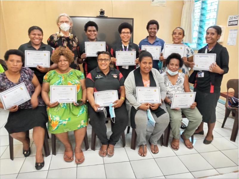 Jane Menke awards EmOC certificates to completing participants at Port Moresby General Hospital.