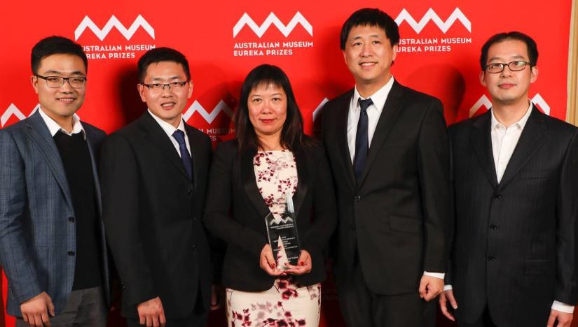 Fang Chen and colleagues in 2018, celebrating their Eureka Prize