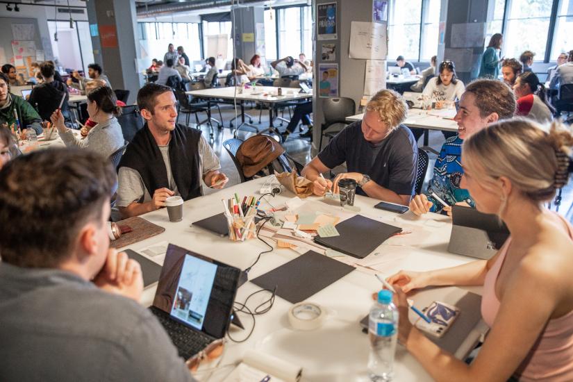 Students working together at a desk
