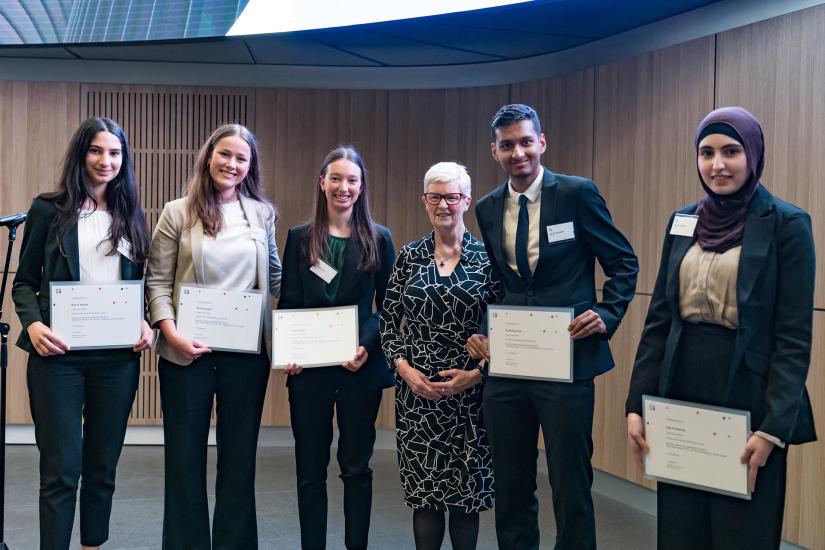 Team members accepting their awards