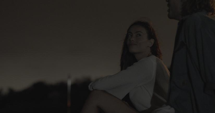 Amber looks at Finn, from Swings and Roundabouts