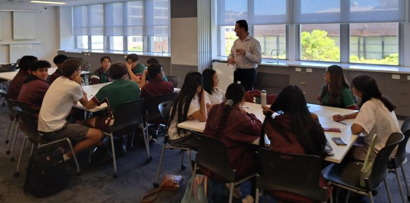 high school students in a classroom at UTS with a teacher