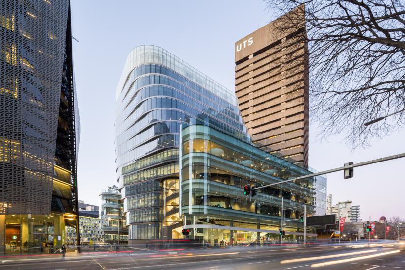 Image of Building 2 and UTS Tower taken from across Broadway at twilight