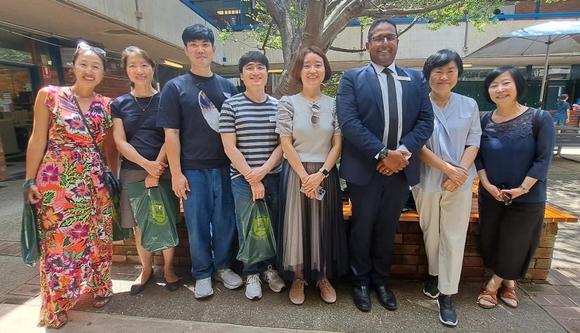 outdoor group photo with Korean and UTS teacher education academics