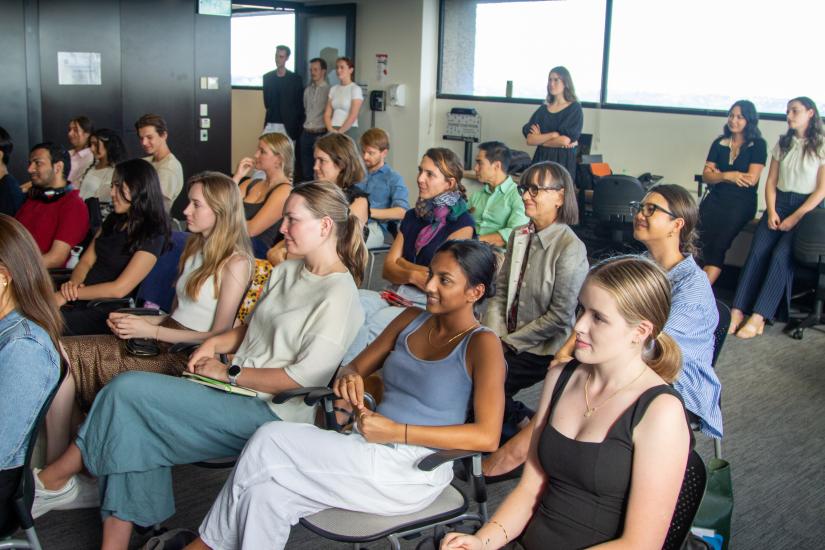 The crowd listens to the panel