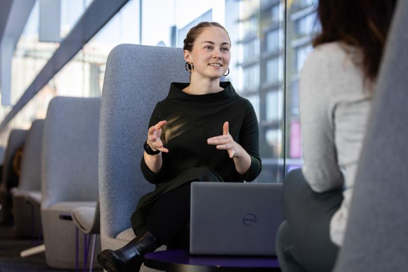 Student talking to mentor