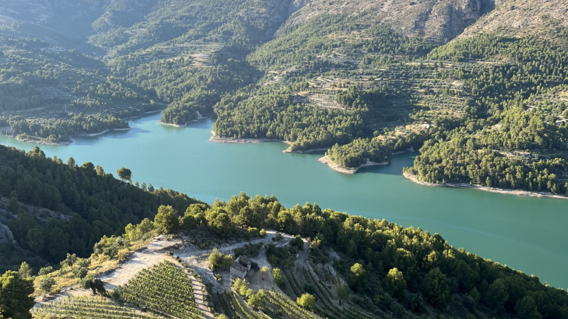 Photography of lake and hillsides