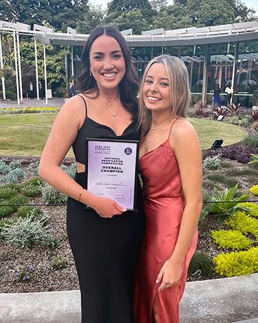 Emma Gaston and Chandra Renouf with their award