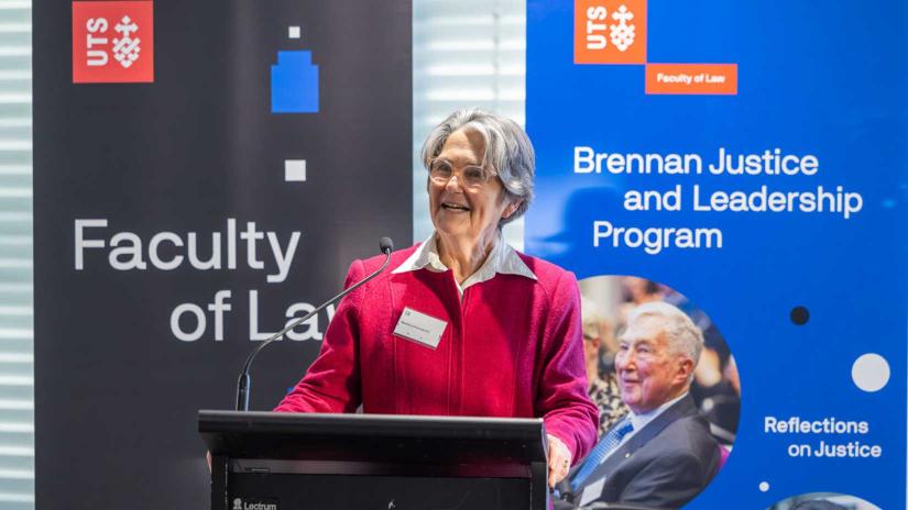 Madeline Brennan speaks on stage