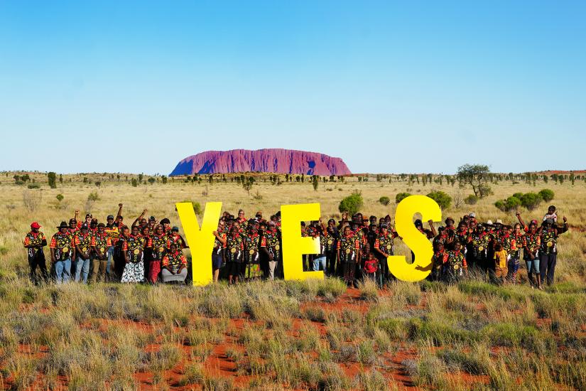 Group shot of Central Land Council members gathered at Uluru. Image provided with a Central Land Council media release