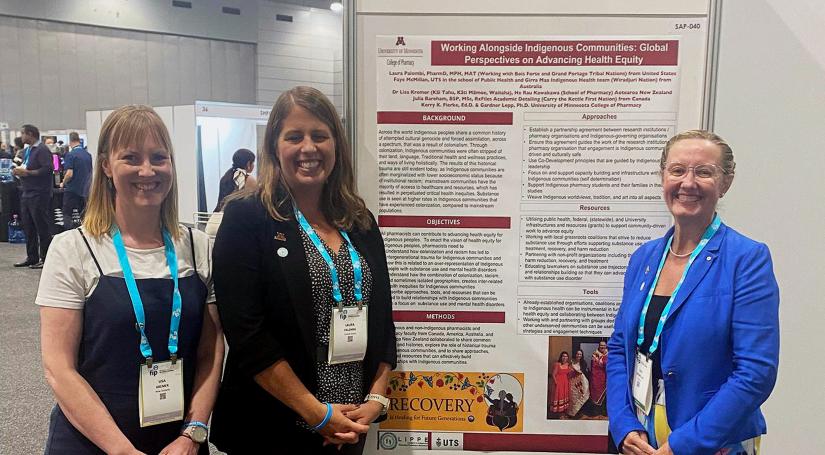 three women smiling at camera