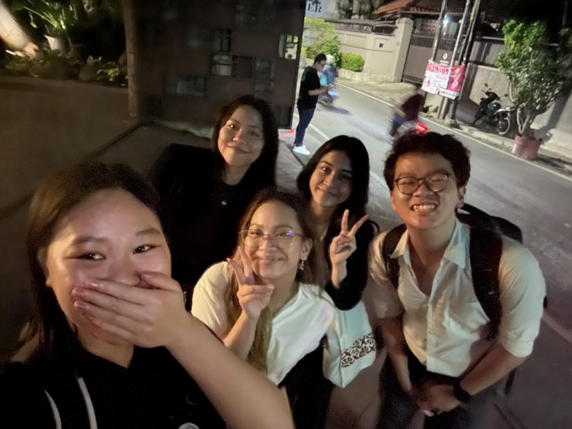 Ashly and other students smile for a selfie in Indonesia